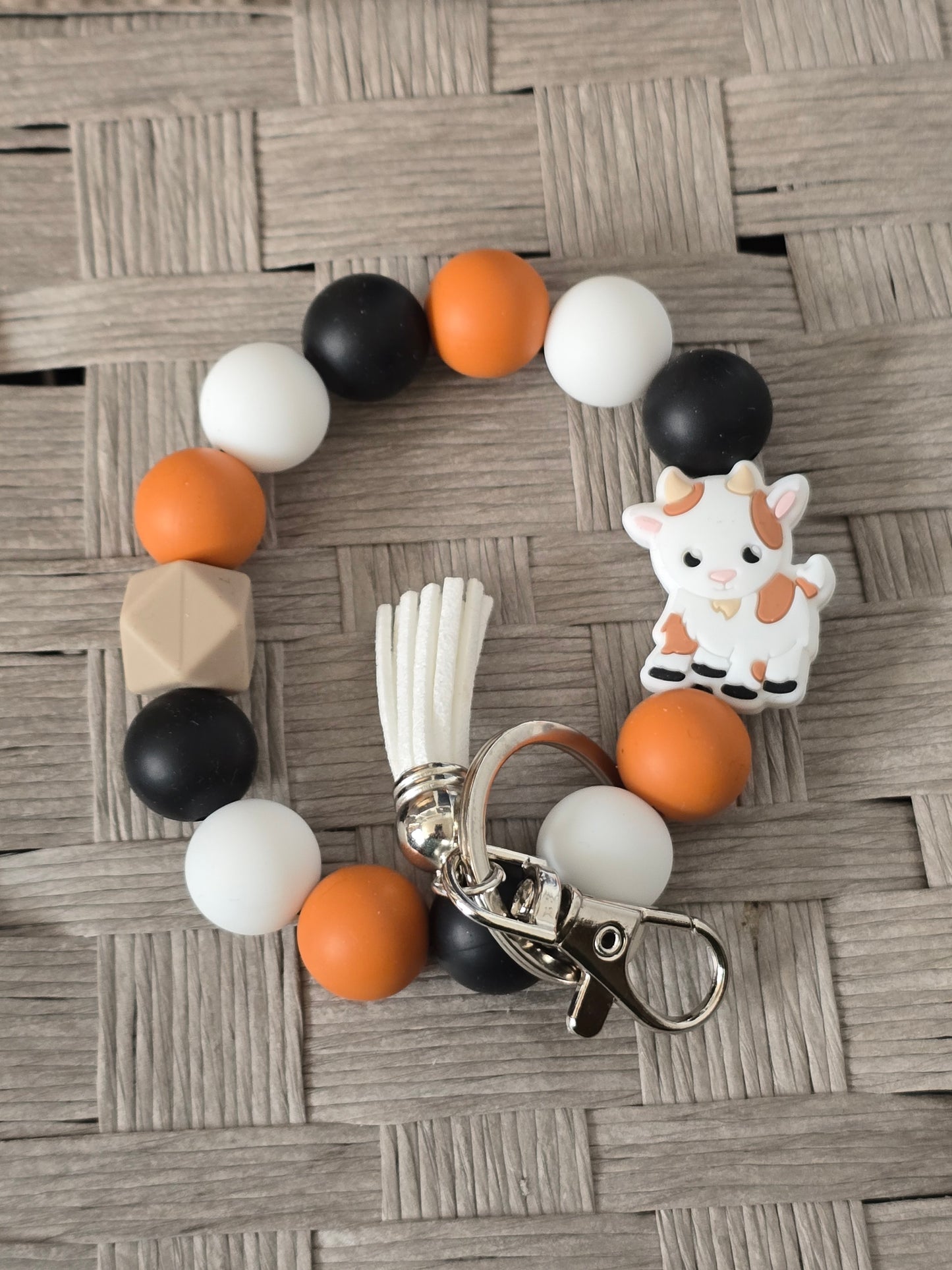 White Goat Wristlet
