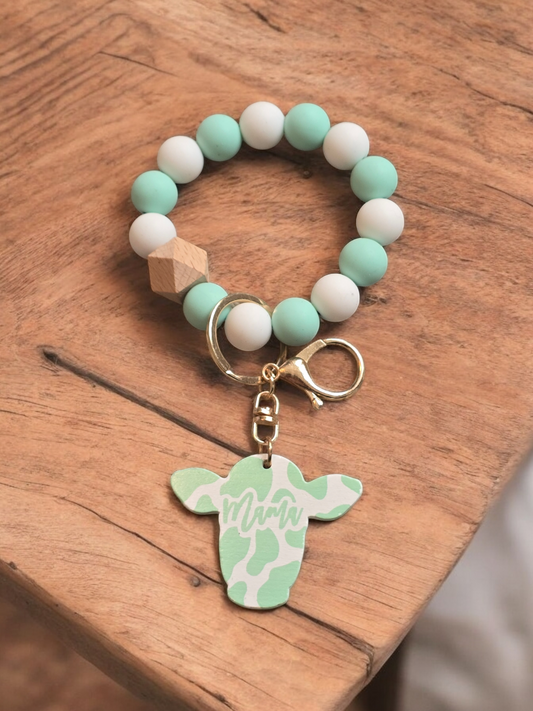 Green Cow Wristlet